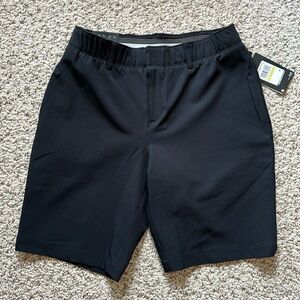 NWT Ladies U/A short in black. Size 4